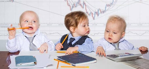 three toddlers pretending to prepare taxes Helland & Hurwitz Attorneys at Law Colorado