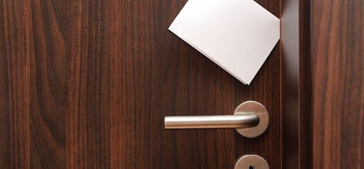 white note in door jam Helland & Hurwitz Attorneys at Law Colorado