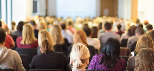 room full of participants attending a family law conference Helland & Hurwitz Attorneys at Law Colorado