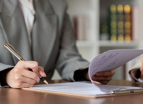 female attorney provides legal services for client Helland & Hurwitz Attorneys at Law Colorado